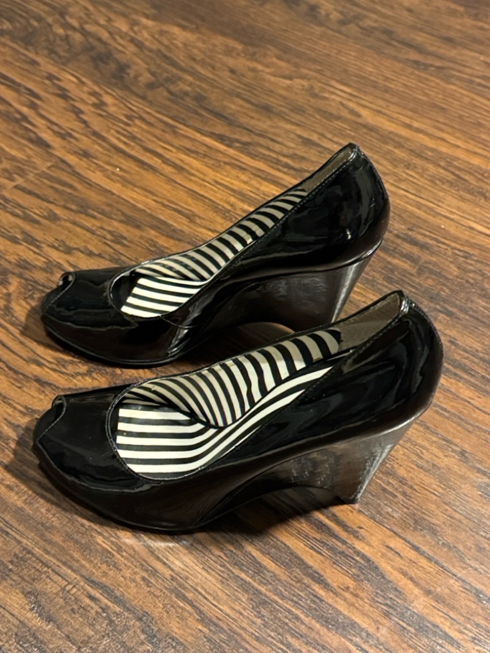 BCBGirls Black Patent Peep-Toe Wedge Heels with Unique Pointed Heel